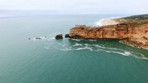 Aerial view of the Nazare Lighthouse in Portugal. Place of the biggest waves on the planet.