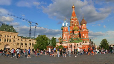 Moscow, Russia - June 25, 2018: Tourists walk along the Red Square in Moscow at St. Basil’s Cathedral. Days of the World Cup 2018 in Moscow.