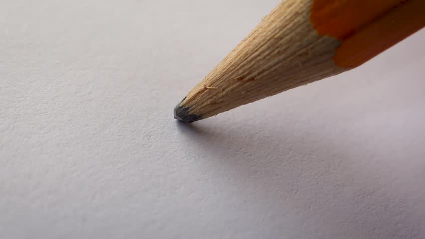 Macro video of an artist drawing a checkmark on a blank sheet of paper. Concept of creativity, minimalism and art. Main focus on the pen with DOF. | Shutterstock HD Video #1027799765
