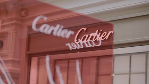 Moscow, Russia - April 10, 2019: Cartier outlet exterior at night. Luxury retailers like Cartier whose sales are hit by China's economy slowdown, pushing marketing campaigns on social-media