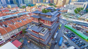 Aerial view video time lapse of Buddha Tooth Relic Temple & Museum in Singapore day to night