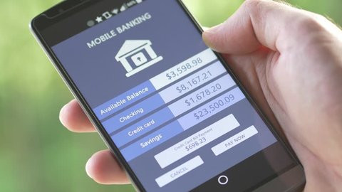 Making mobile baking transactions with a smartphone. In the U.S 56 million people, consider themselves primarily using a mobile device to access their checking accounts.
