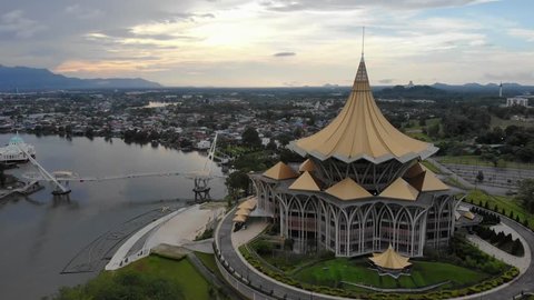Kuching, Malaysia - April 2019. Cinematic aerial shot of Sarawak Legislative Building or known as "Dewan Undangan Negeri Sarawak". This wonderful architecture is a landmark in Kuching Waterfront