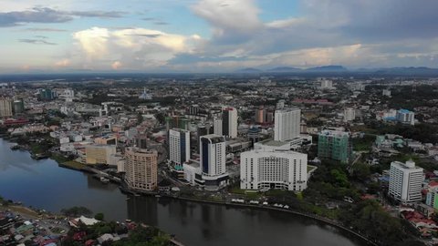 KUCHING, SARAWAK - APRIL 2019. Cinematic shot of Hilton Hotel and Riverside Majestic Hotel, Kuching. These hotels are located at Jalan Main Bazaar and are among the largest hotel in kuching