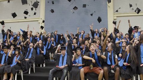 Santos/SP/Brazil - October 23 2018: Graduation Caps Are Tossed Into The Air By A Happy Group Of Student Friends
