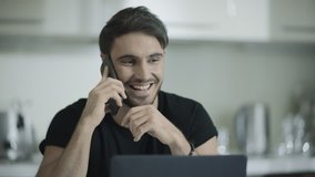 Happy business man talking phone at home. Happy businessman using mobile phone at kitchen. Portrait of smiling professional have conversation on smartphone. Handsome person talk cellphone - Powered by Shutterstock - Get 15% off with code: PIKWIZARD15