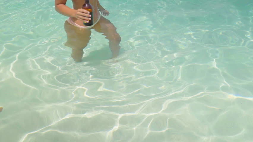 Beautiful Young Woman Standing in Tropical Waters in Chouchou Bay, Haiti