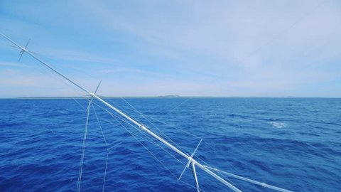 Outrigger deep sea fishing with Curacao landscape visible far in distance