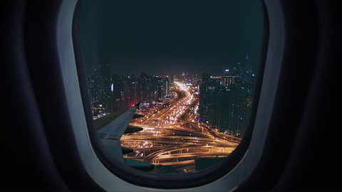 Plane Window as Descending Over Metropolitan Urban City Landscape Business Trip Travel Aerial Flight