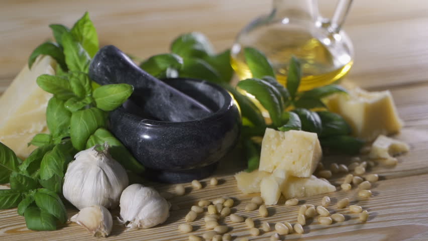 Genoise pesto sauce and ingredients on the wooden table