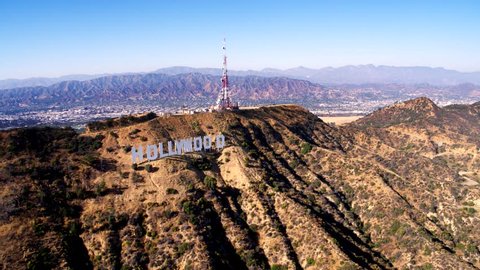 Los Angeles, CA / USA - July 20, 2017: Hollywood Sign, Griffith Park Observatory and view of Downtown Los Angeles