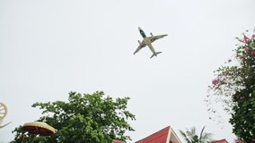 Passenger airliner flying overhead