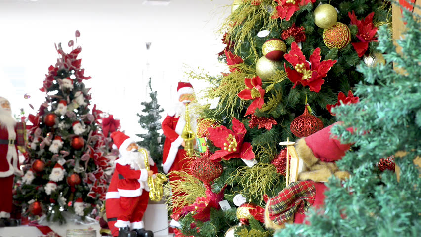 Christmas decoration with Christmas trees and Santa Clauss. Panoramic plane