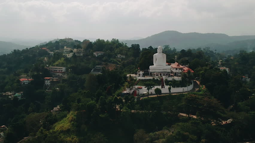 Aerial of Big White Buddha statue in Kandy. Bahirawakanda Vihara Buddha Statue, Kandy, Sri lanka