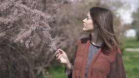 Spring Time, Beautiful young Woman Closeup Outdoors in the Park, Slow motion clip