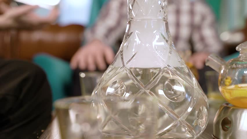 Shisha with fruit bowl in hookah bar, close-up