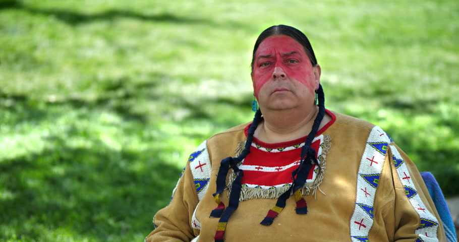 Native American Indigenous Indian tribe chief at the willage, 4K