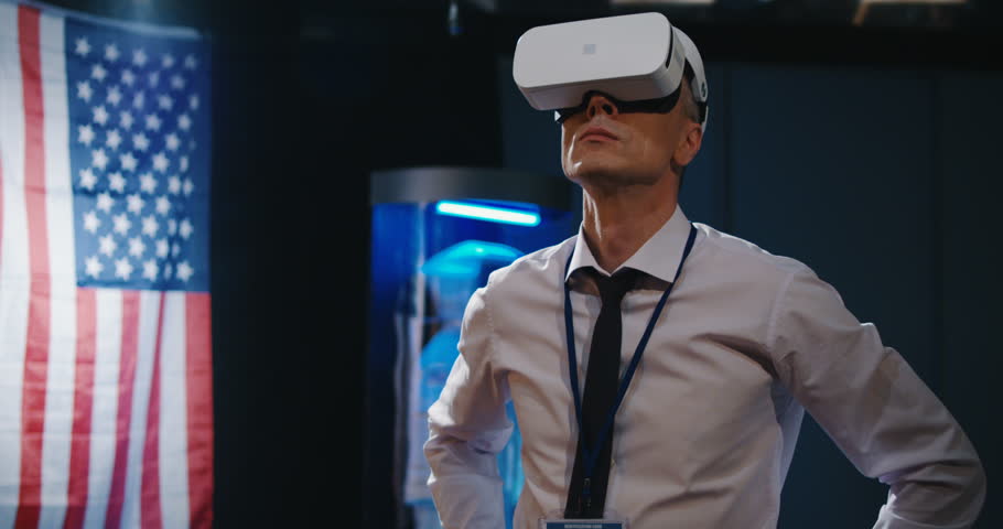 Medium shot of a man using a VR headset