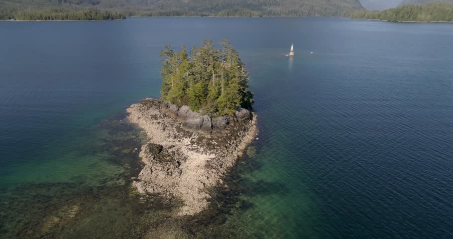small island by the coast of Vancouver Island (British Columbia / Canada). Drone footage.