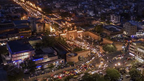 Pink city gate in Jaipur, India, 4k night traffic hyper lapse aerial skyline