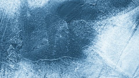 Close-up of melting ice on black background