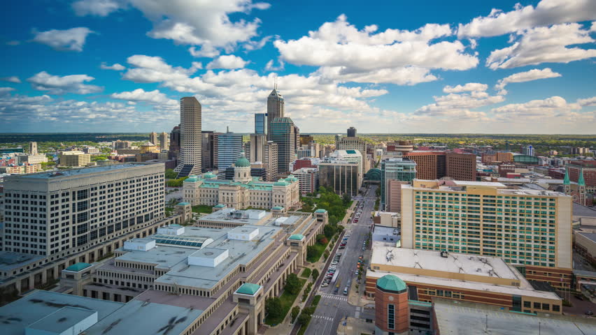 Indianapolis, Indiana, USA downtown city skyline with the State House in the afternoon.