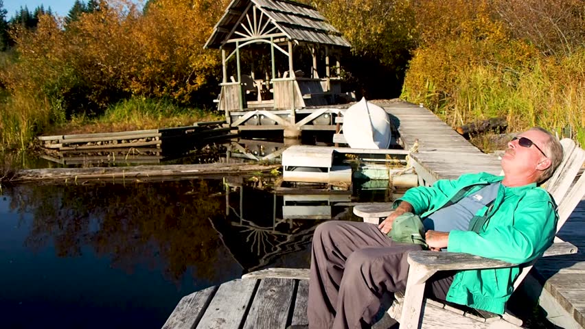 Man relaxing on dock