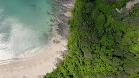 Drone footage of beautiful paradise beach. Movement from right to left. Nui Bay, Koh Lanta, Thailand.