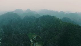 4k Aerial drone footage - Beautiful mountains and jungle of northern Vietnam at sunset.  Asia