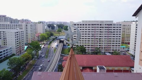 Asian Content (Singapore Places Of Worship) : Aerial travelling shot of Islamic Mosque Masjid Al-Iman in the heart of Residential Estate - Singapore Circa June 2017.