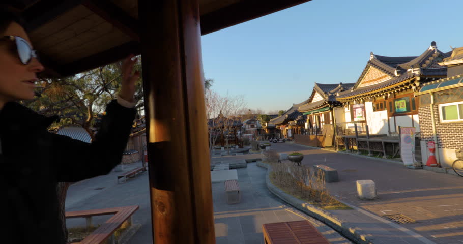 woman walking korean style in Jeonju Hanok Village