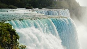 The swift flow of Niagara Falls water. Water of a beautiful blue hue. Slow motion hd video