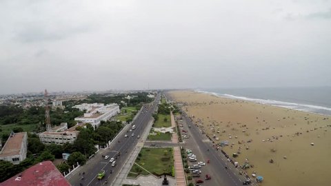 Time Lapse aerial view of Beach and Road in Chennai, India