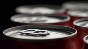 top view on red can of soda or beer rotate background. Slow motion video dolly crane shot medium extreme close up panorama high angle telephoto lens