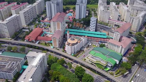 Asian Content  : Aerial travelling shot of Islamic Mosque Masjid Al-Iman in the heart of Residential Estate - Singapore Circa June 2017.
