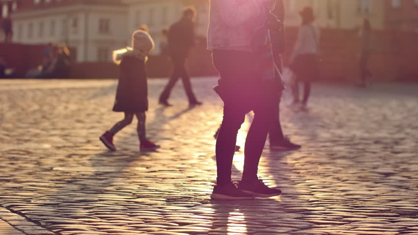 People walking on the streets of Warsaw's Old Town. Unrecognizable people footage. | Shutterstock HD Video #1028111597