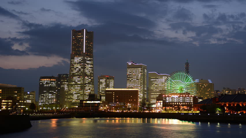 Time Lapse of Yokohama City Skyline Iconic Skyscrapers Car Traffic Dusk to Night