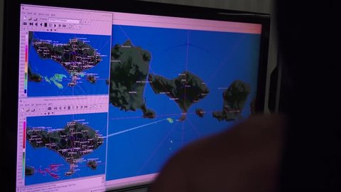 BALI/INDONESIA-APRIL 19 2019: A meteorological forecaster at the Ngurah Rai International Airport in Bali, is conducting a forecast by looking satellite imagery for flight meteorological information.
