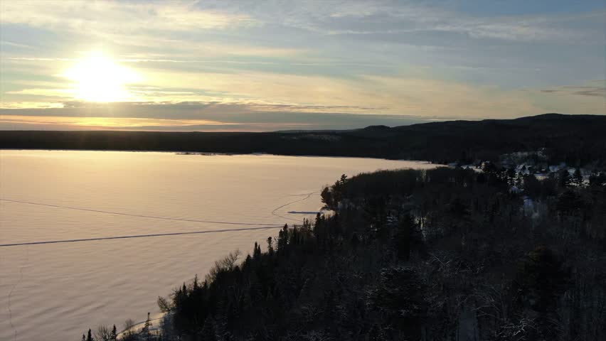 Snow Covered Lake in Northern Michigan Copper Harbor Sunset.