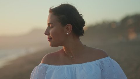 Portrait of pregnant woman on the beach at sunset in Malibu  Stock Video