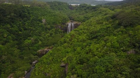 aerial view,flying over the 2 waterfalls in the forest nature green landscape in mauritius.filmed with drone in 4K 30fps