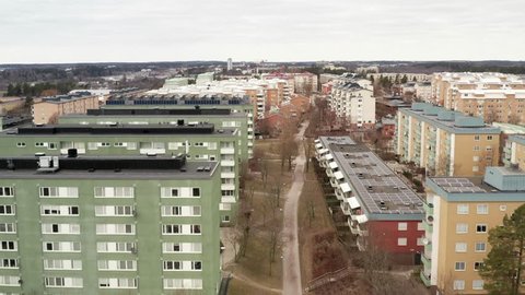 Aerial 4k drone shot of ghetto Rinkeby, Tensta in Stockholm Sweden. Concentration of immigrants, people with immigrant ancestry, foreign roots. Swedish Scandinavian largest slum in suburb. No go zone