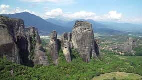 Aerial View of Amazing Meteora Rock Formation in Greece with Shadows from Clouds. 4K Video Clip