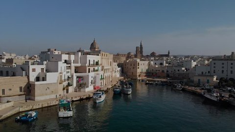Drone footage of the port of Monopoli in the metroplitan city of Bari Southern Italy, Puglia (Apulia) Shot with the DJI Mavic Air