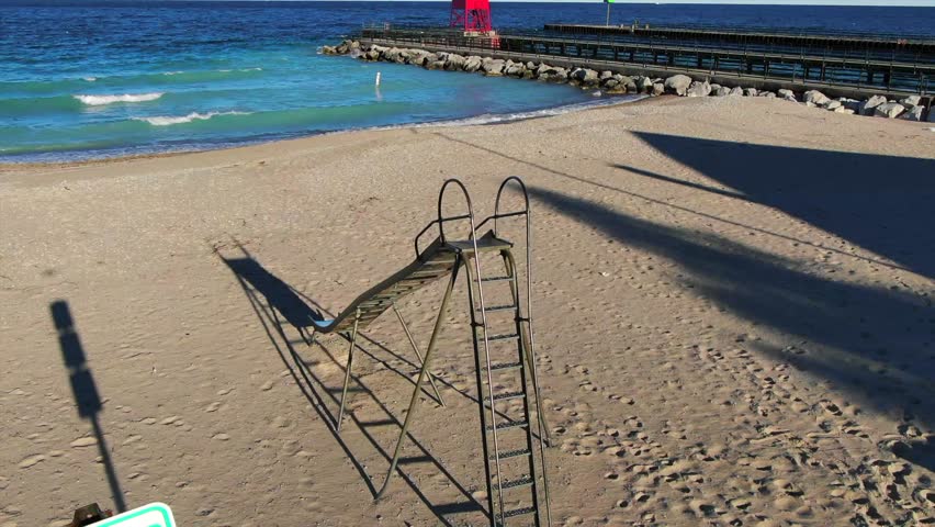 Lighthouse in Charlevoix Northern Michigan Sandy Beach Slide Playground.