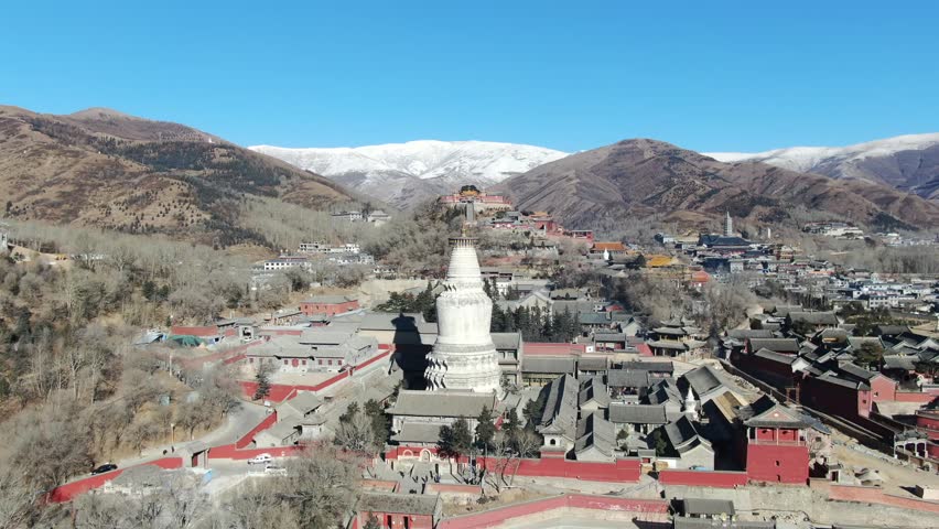 Aeria vedio of Chinese temple ,Mount Wutai  temple,snow mountain,Shanxi 