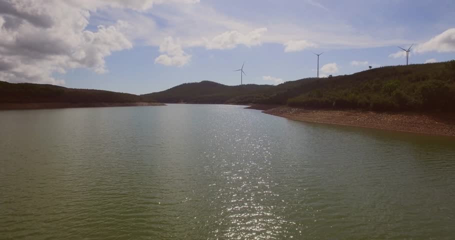 A lake near Albufeira, Portugal, with people SUP-ing