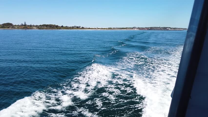 Departing Robben Island by boat, headed towards Cape Town.