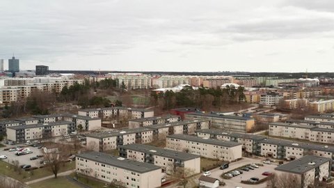 Drone aerial view of Rinkeby, Tensta in Stockholm, Sweden. Ghetto like concrete jungle buildings in suburb. Dangerous place no go zone