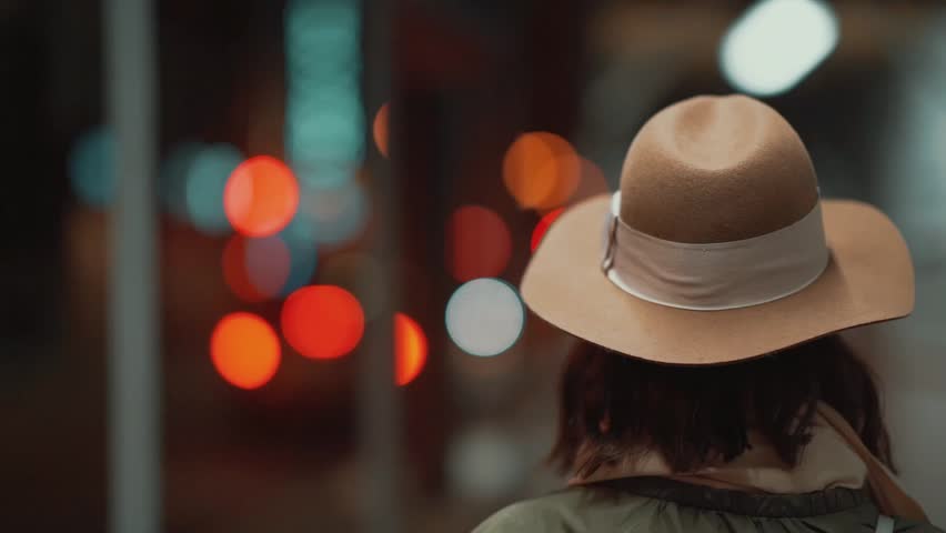 Beautiful girl on the background of lights